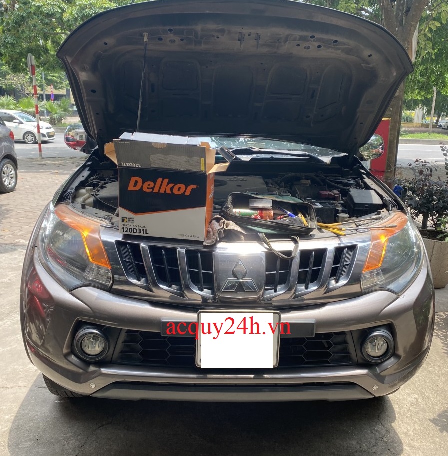 Thay bình ắc quy Delkor bảo hành 12 tháng cho Mitsubishi Triton